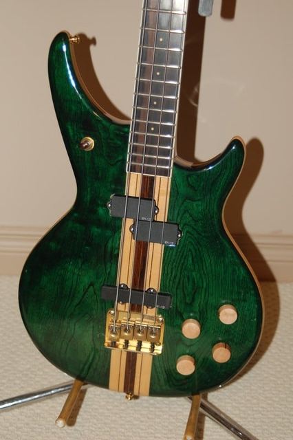 Green-stained bass with a laminated neck