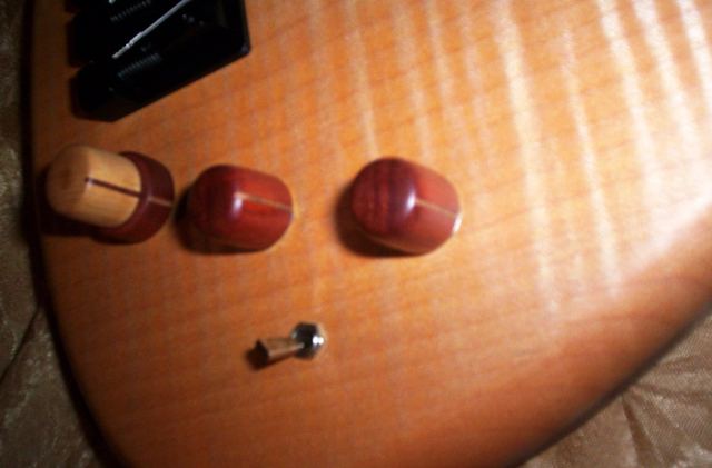 Wooden knobs installed on a flamed top